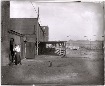 Commercial Buildings or Stables in Front of the Barnum and Bailey Circus Tent at Grand and Laclede by Charles Clement Holt